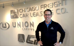 Todd Heemsoth next to Union Leasing sign