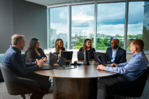 Moventum employees in conference room
