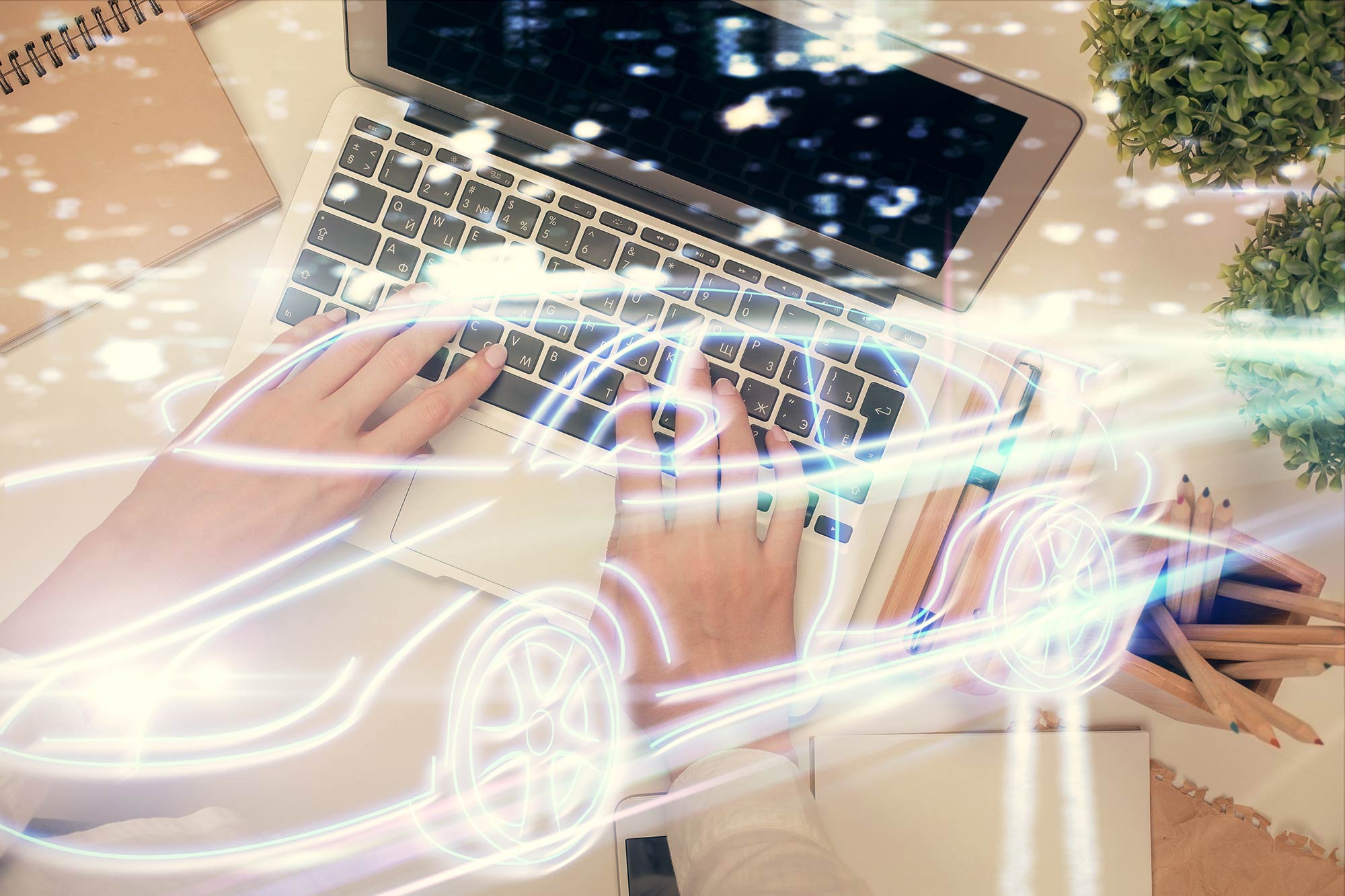 Car data in front of a computer