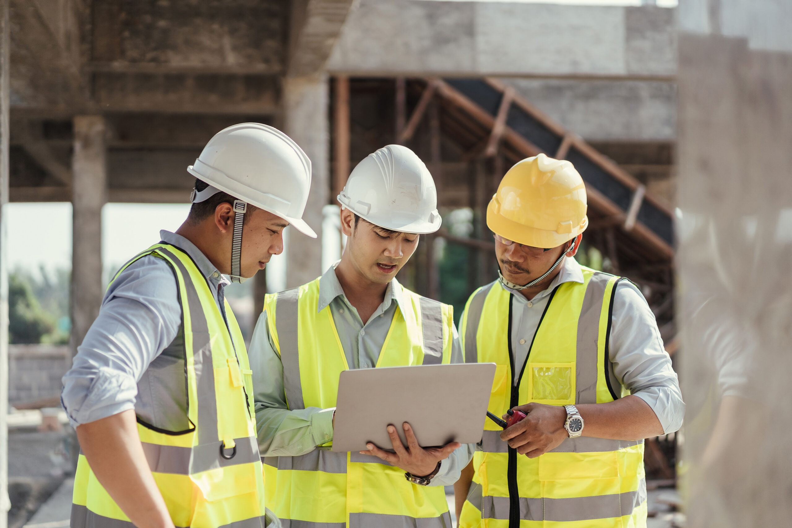 Construction finance professionals talking about fleet management.